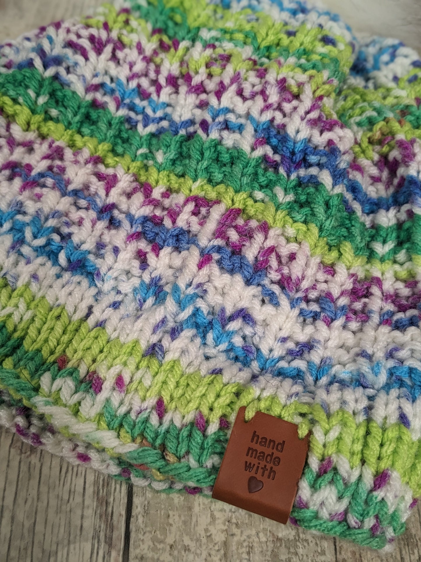 Hand knitted with love bright colours funky unique green purple blue white ribbed texture beanie bobble faux fur pompom hat #PoshTags